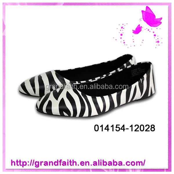 black and white rubber shoes