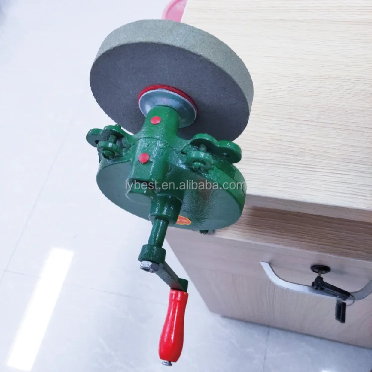 Hand deals grinding wheel