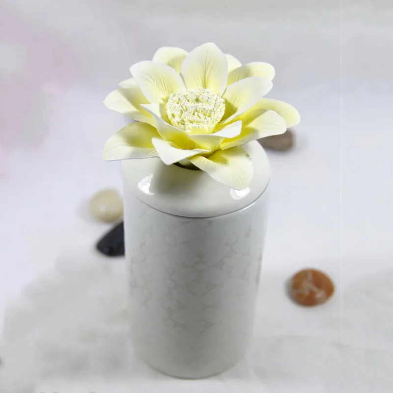 

Decorative white porcelain vase bottle with handmade flowers for essential oil diffuser