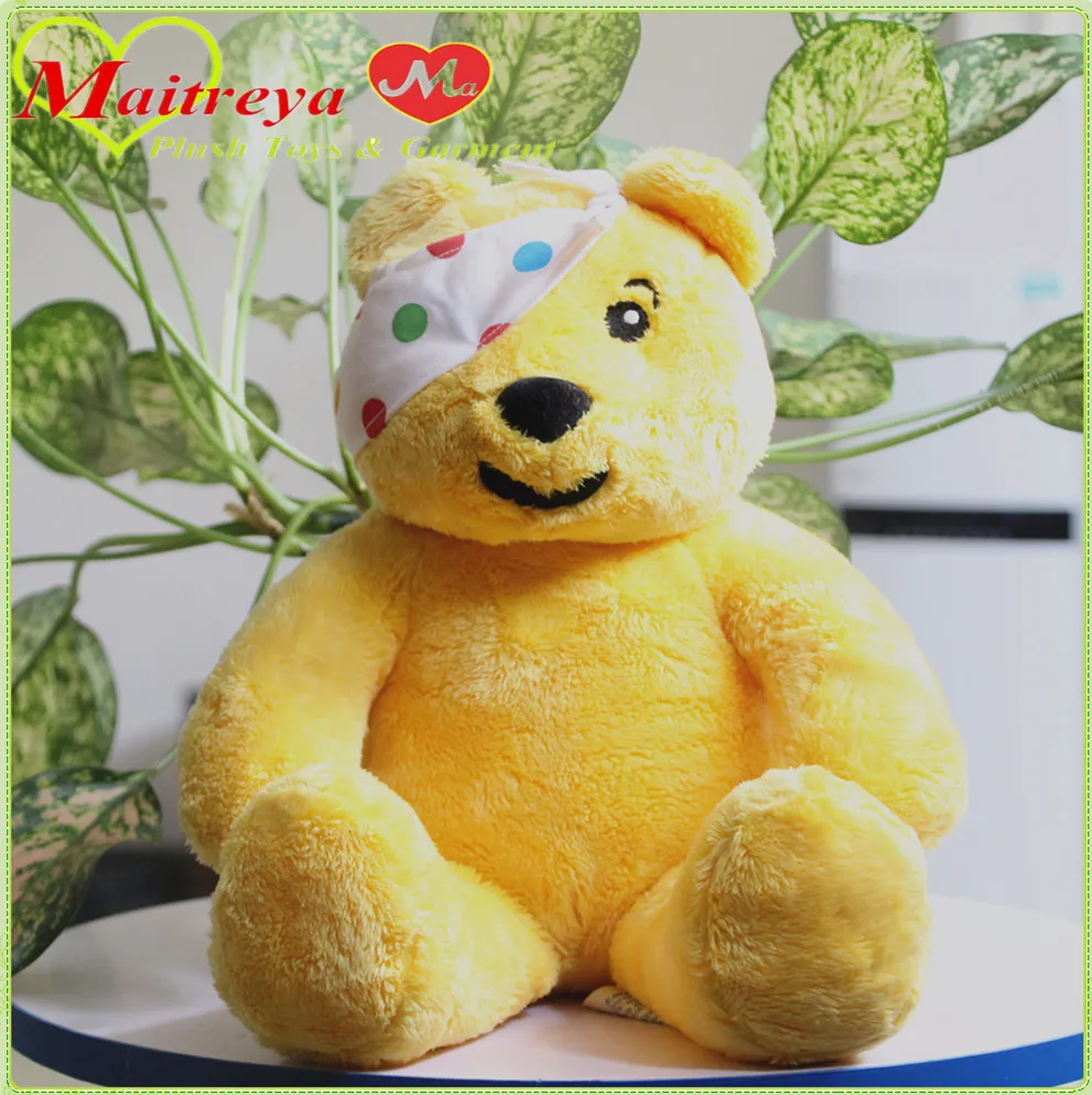 yellow teddy bear stuffed animal