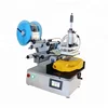 Semi automatic battery plane flat labeling machine