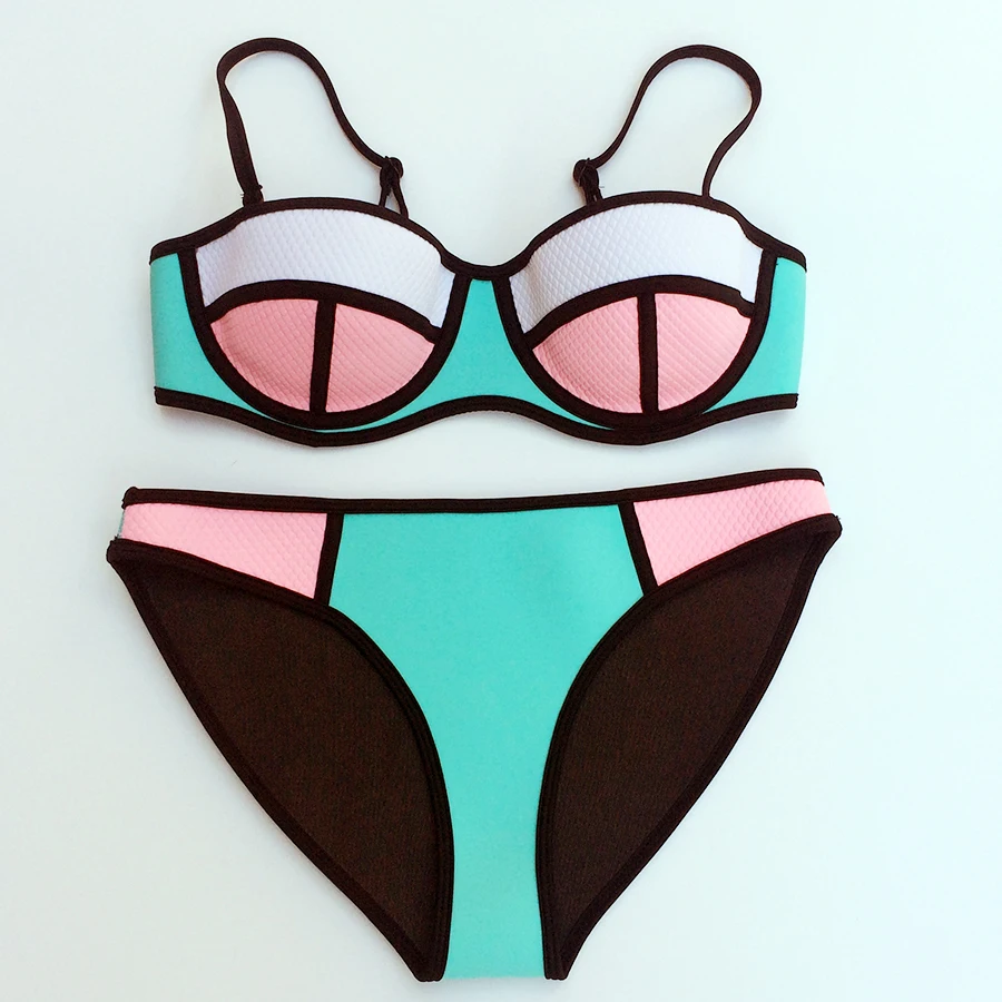 Triangle bathing suit company TRIANGLE BIKINI TOPS. Get wrapped up in HAPARI's Triangle Tie-Front String Bikinis, a stunning design with a cut that provides more coverage than you’ll find in most string bikinis.