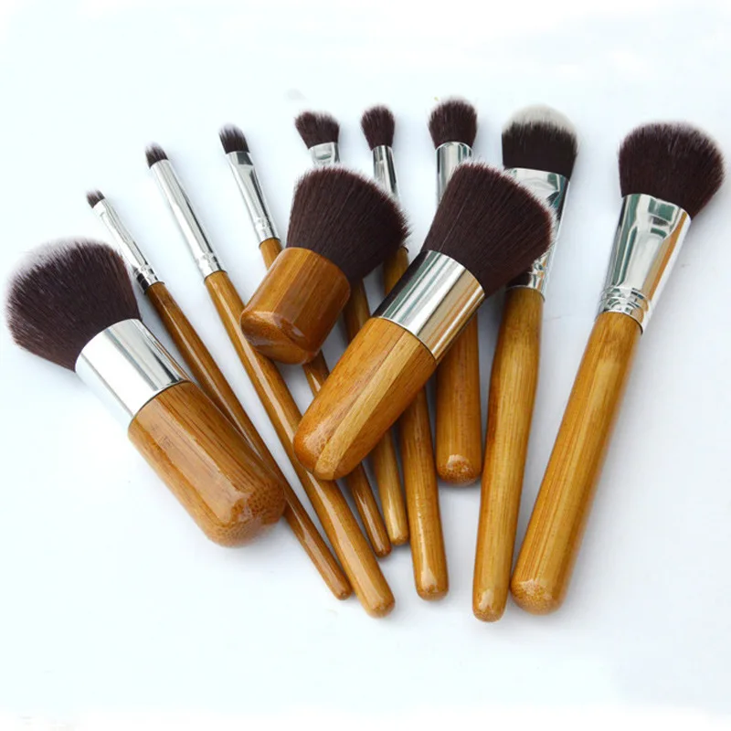 

11 pieces Bamboo Wood handle professional Skin-friendly Cosmetic makeup brush set with canvas bag packed, Wooden color handle