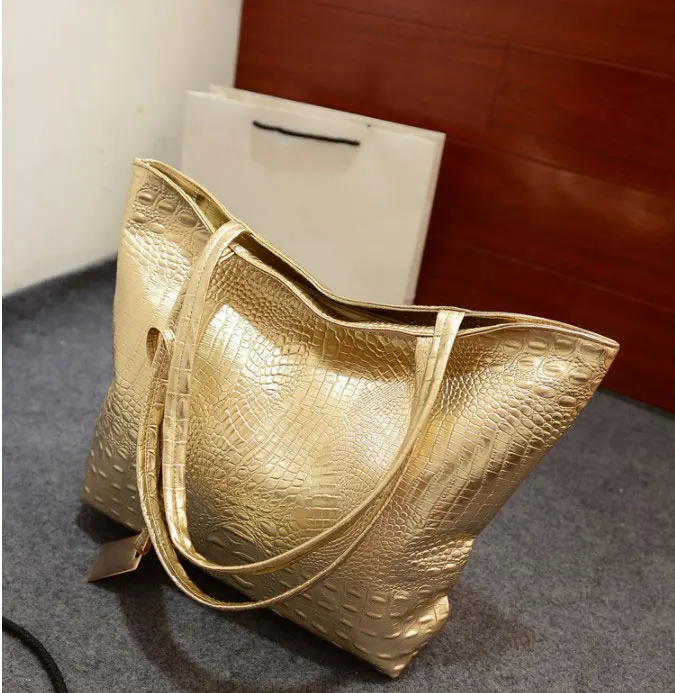 gold croc bag