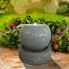 Simple round garden stone looks lighting water fountain