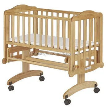 wooden swinging crib