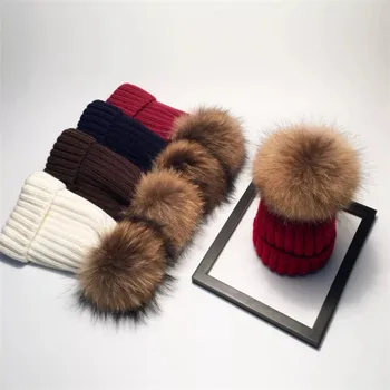 winter hat with fur ball on top