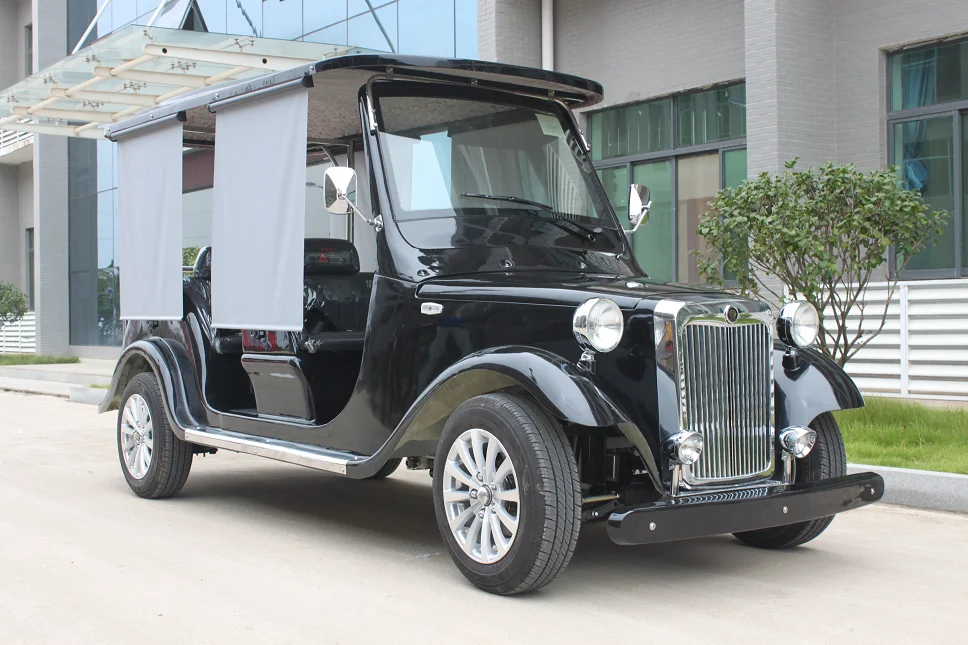 Old fashioned 6 seater electric scooter car automobile