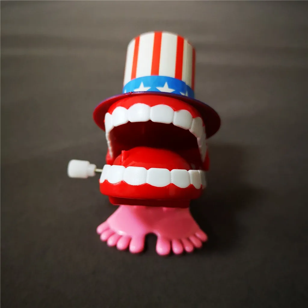 Jumping Wind up chain red lips teeth with hat Dancing toys