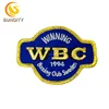 Latest Computer Embroidery Clothing Patch WBC Winning Boxing Sweden Self-adhesive Silver and Gold Metallic Embroidery Patch