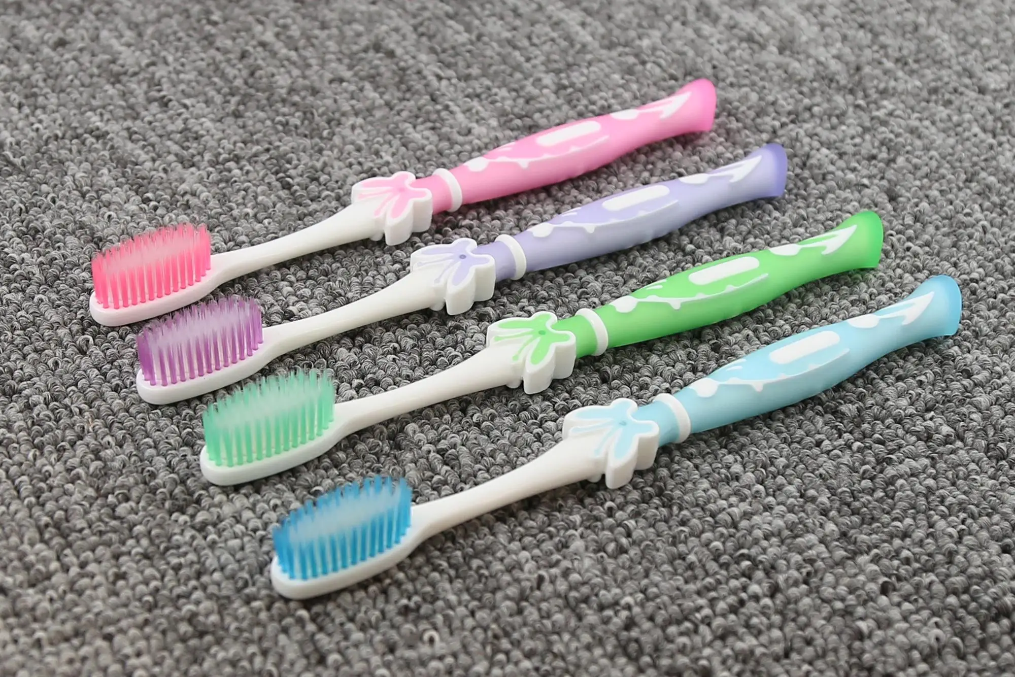 Latest Designed Adult Toothbrush With Soft Tapered Filament And High
