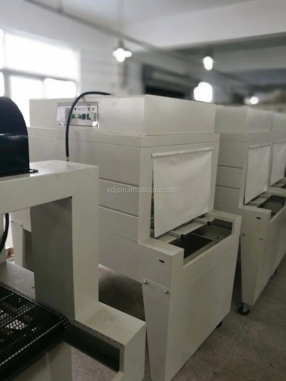 Multifunction Pet bottle shrink wrapping machine,bottle cap shrink wrap machine,shrink film machine