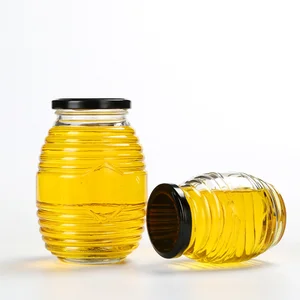 Image of Hot sale empty round honey glass jar unique transparent glass jar honey container food storage jar glass jars for honey