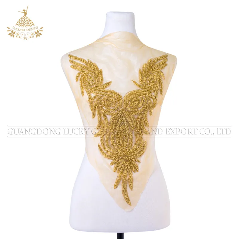 

Pearls sew on appliqued on fabric for wedding bridal dress, Gold