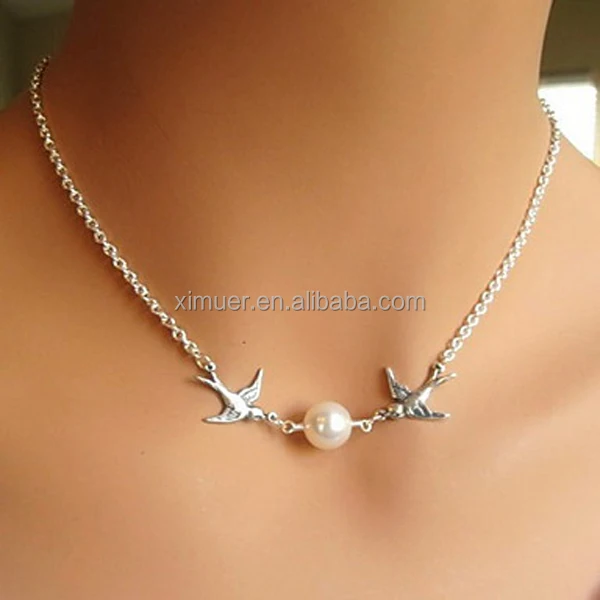 

Pair of lovebirds pearl choker necklace