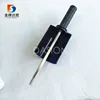 Removing old wax from ski base with metal brush