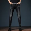 New men's jeans in 2018 five bags of small-legged trousers black casual trousers.
