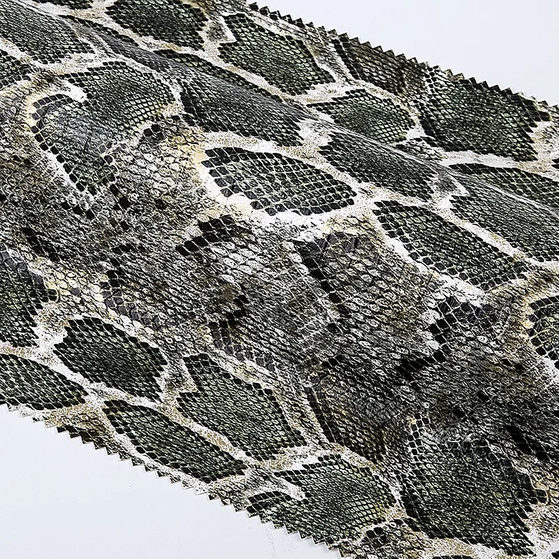 优质聚氨酯通量蛇皮皮革织物乙烯基仿印花人造蟒蛇皮服装纯素皮革