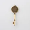 PandaHall Alloy Double Sided Skeleton Key Pendant Cabochon Settings Nickel Free Antique Bronze Flat Round Tray 20mm