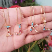 

2019 best selling wholesale gold plated rainbow stone letter small pendant necklace for women and girls