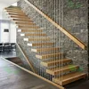straight floating wood staircase with stainless steel railings