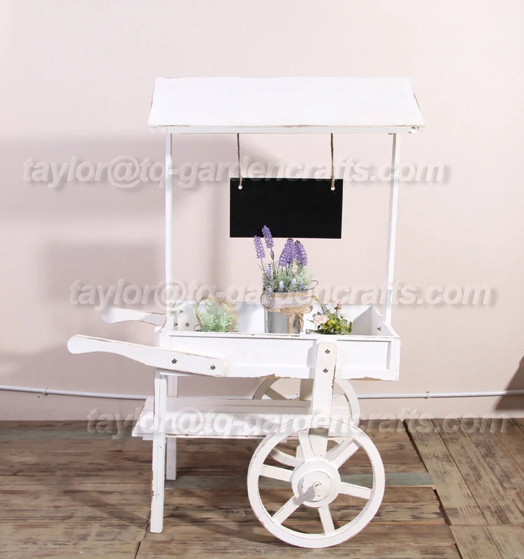 wooden window flower rack.jpg