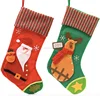 a seasonal red christmas gift stocking with hanging tag- ideally around 43cm