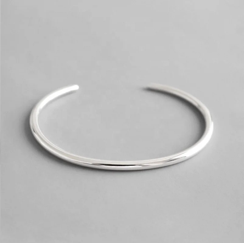 

Rhodium Plating plain engraved sterling silver bracelet