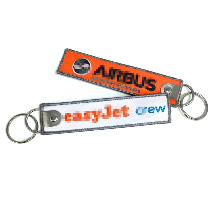 
New design low MOQ custom logo Embroidered keychain keyring 