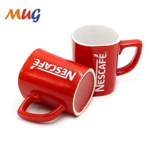 Image of Red glazed white printed Nescafe ceramic coffee mug