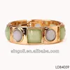 Fashion golden bangle with jade pave set china manufacture