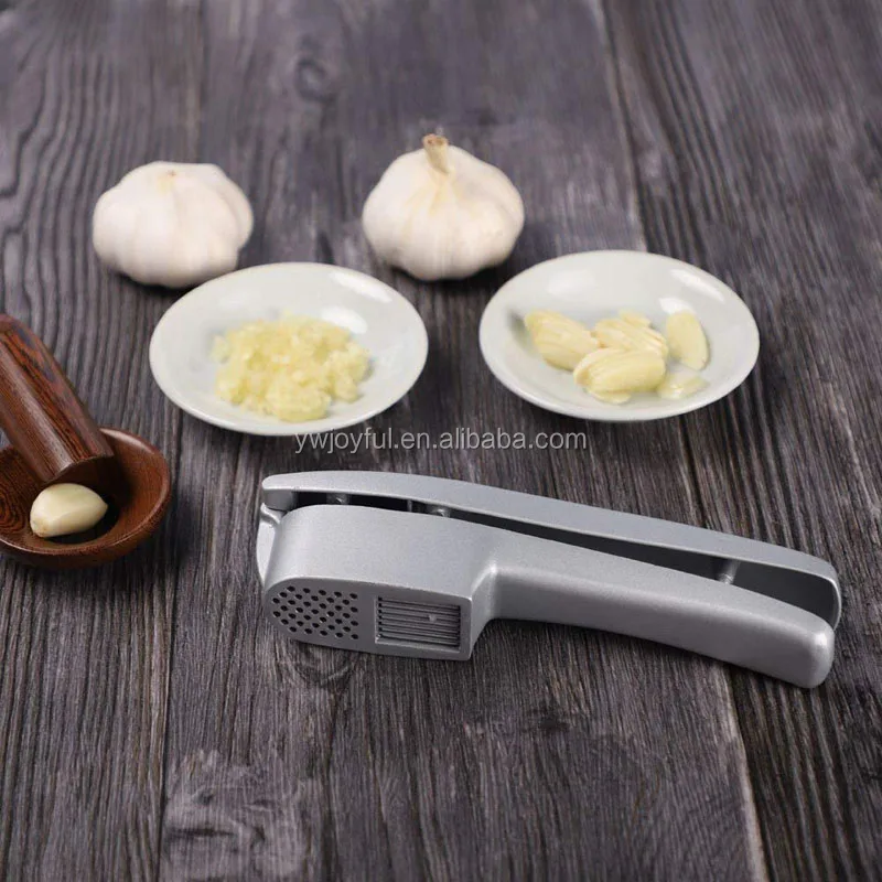 antique silverware garlic slicer