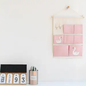 Image of Wholesale pink door hanging bag with cartoon 7 cases wall storage bag