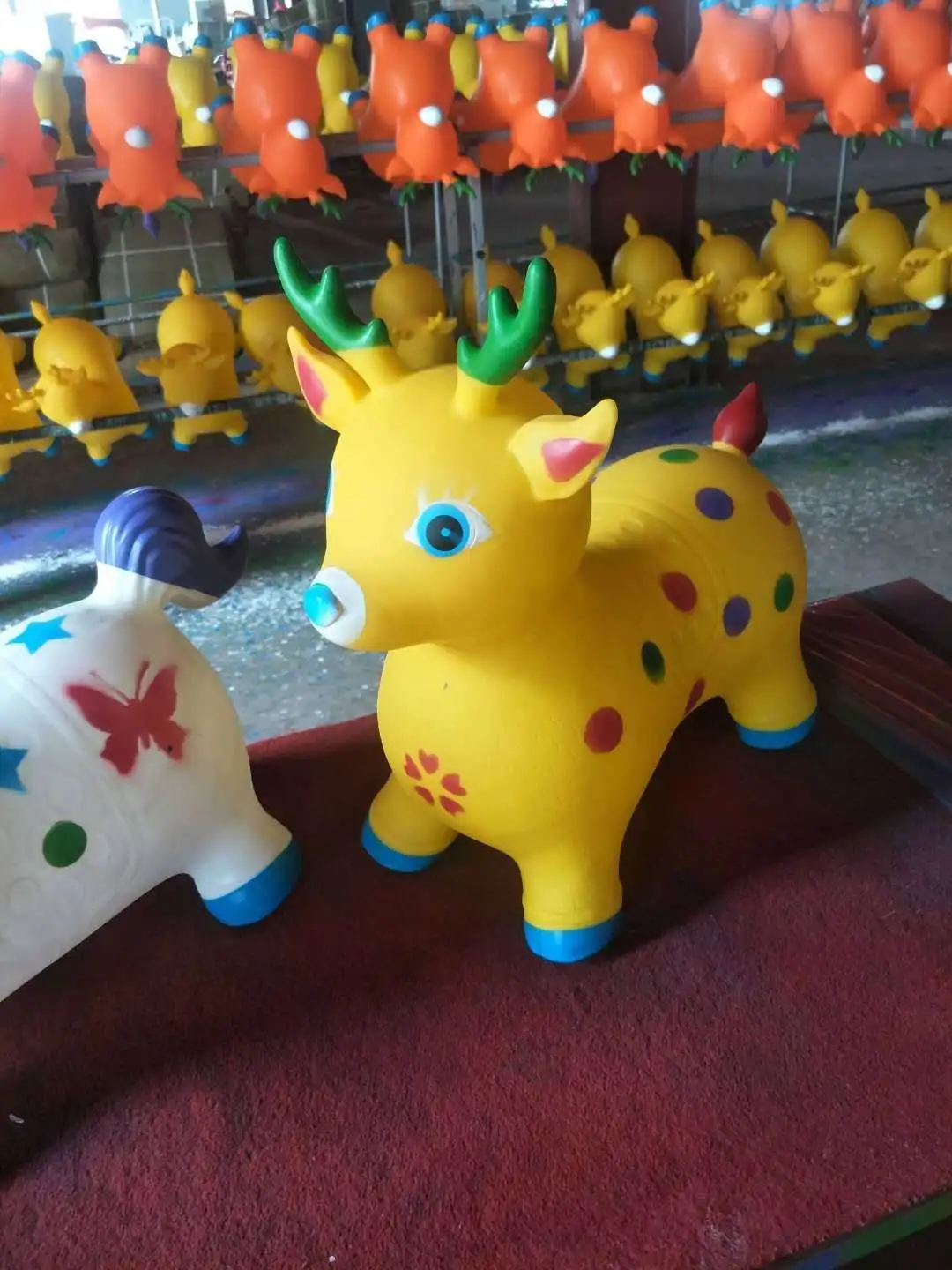 
inflatable unicorn jumping animals/horse toy with light and music/ride on toy 