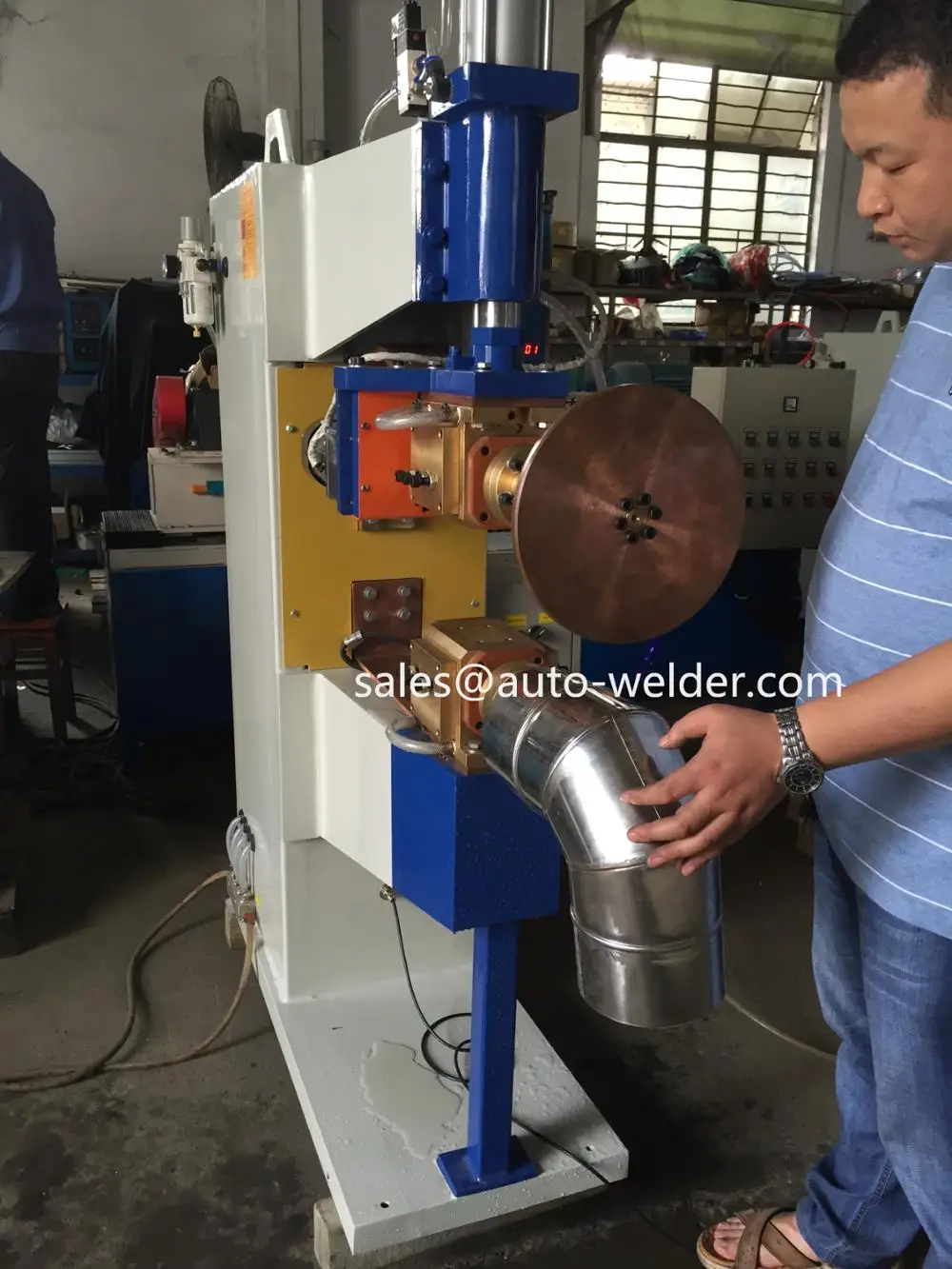 
FN-100K Vent Pipe Elbow Rolling Seam Welding Machine 
