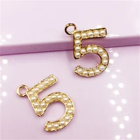 

Popular DIY Wholesale 443 Pearl Alloy Metal Letter Digital Pendants