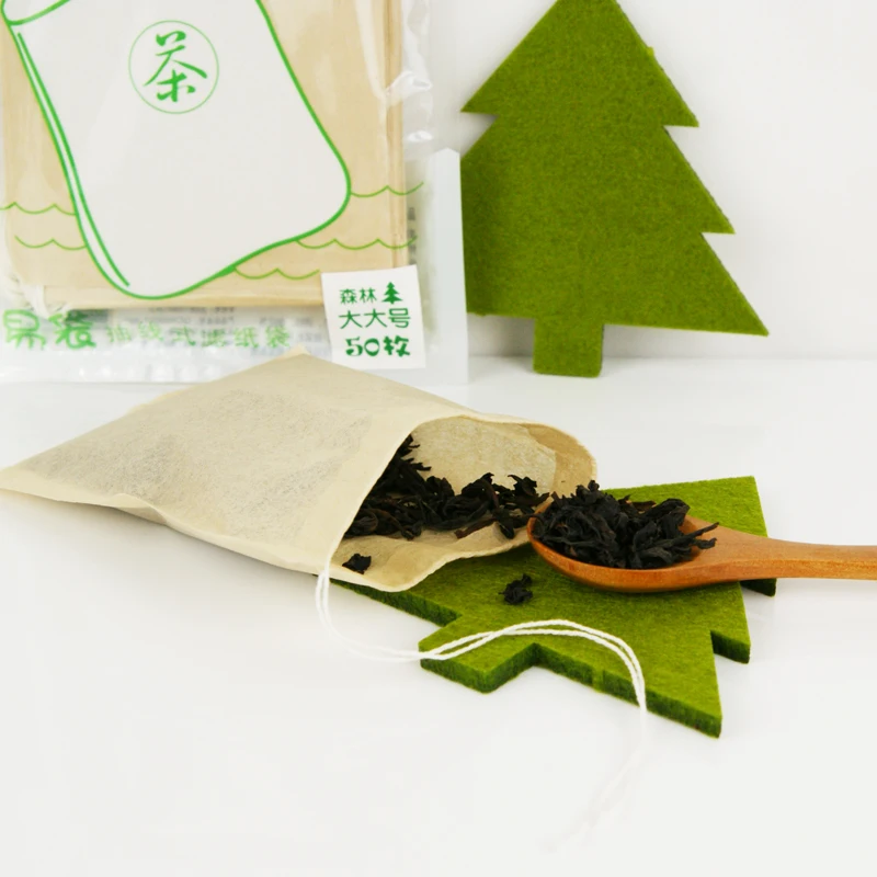 

Easy use Customized tag drawstring empty unbleached filter paper tea bags for loose tea