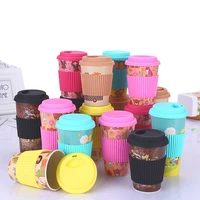 

Wholesale 450ml Custom Printed Pattern Logo Reusable Bamboo Fiber Coffee Cup with Silicone Holder