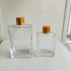 /product-detail/100ml-50ml-square-spirit-flasks-glass-bottle-screw-cap-super-flint-alcohol-mini-vial-bottle-high-clear-liquor-tequila-bottle-60748478987.html