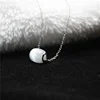 Drum white color natural stone pendant and silver make jewelry