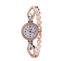 

Luxury Rhinestone Watches Women Stainless Steel Quartz Bracelet Watch Ladies Dress Watches (KKWT82072)