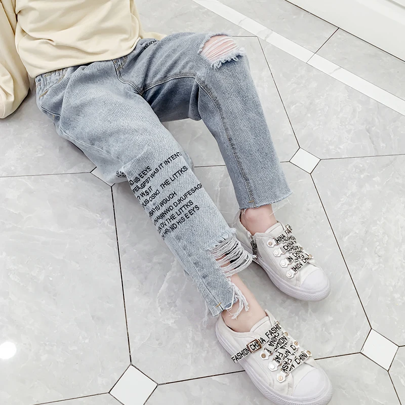 
Good Quality Girls Fashionable Spring Washed Denim Pants Kids Letter Printed Jeans 