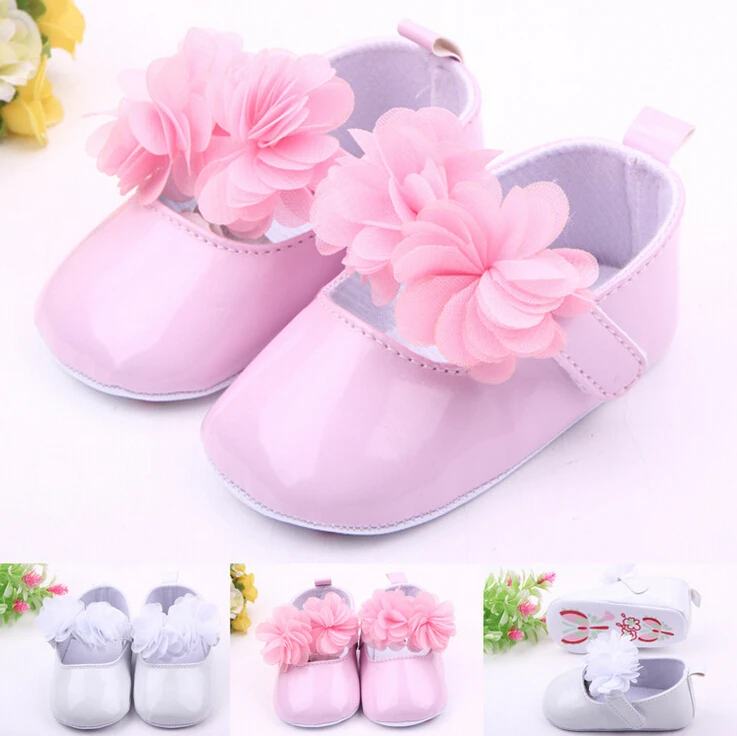 white leather baby girl shoe 