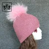 Wholesale women's knitted custom fur Pom Pom winter hat bean.