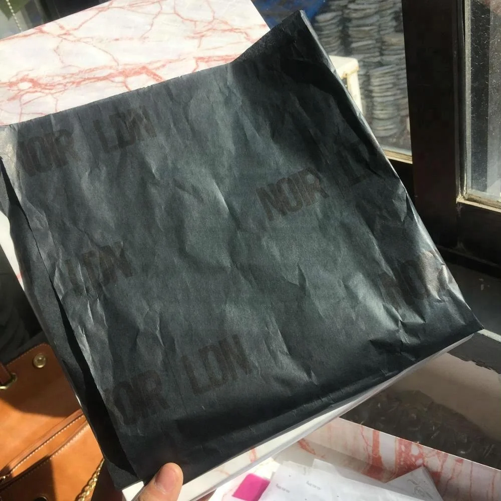 black tissue paper with black logo printing   (7).jpg