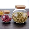 best sell cheap Round ball shaped clear glass canisters heat resistant glass jar with cork lid