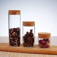 

custom logo size heat resistant clear Glass storage jar nut candy glass canisters with cork