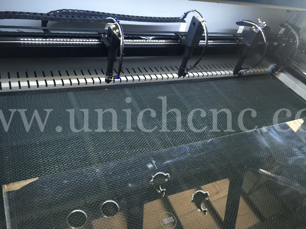 2016 UNICHCNC high precision cnc engraver cutter/four laser heads/fabric laser cutting machine