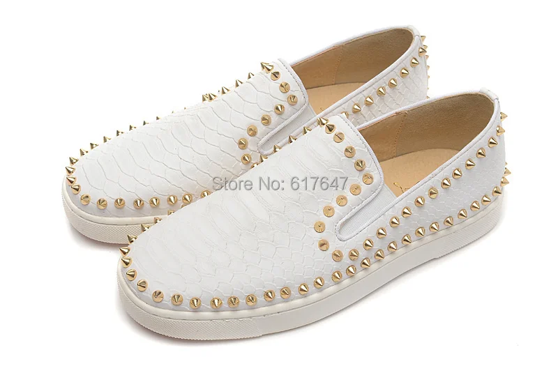 white loafers with gold spikes