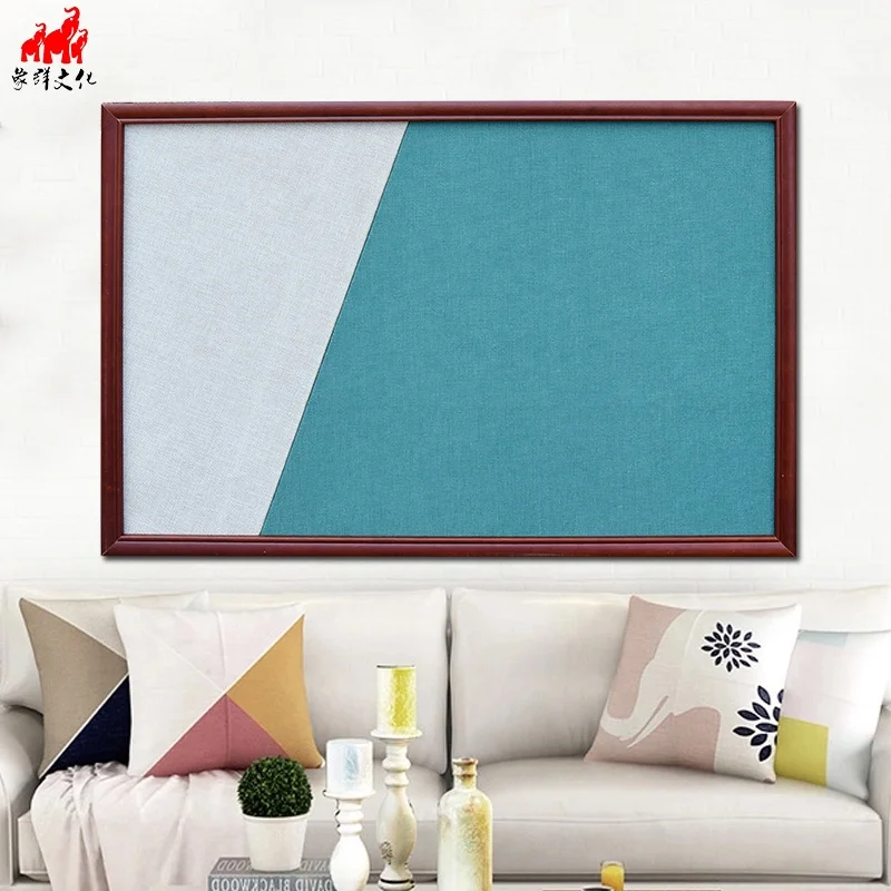 
Staples cork board with wood color frame on wall for sell 